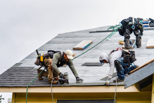 Professional Gutter Installation technician working in Washington, IA